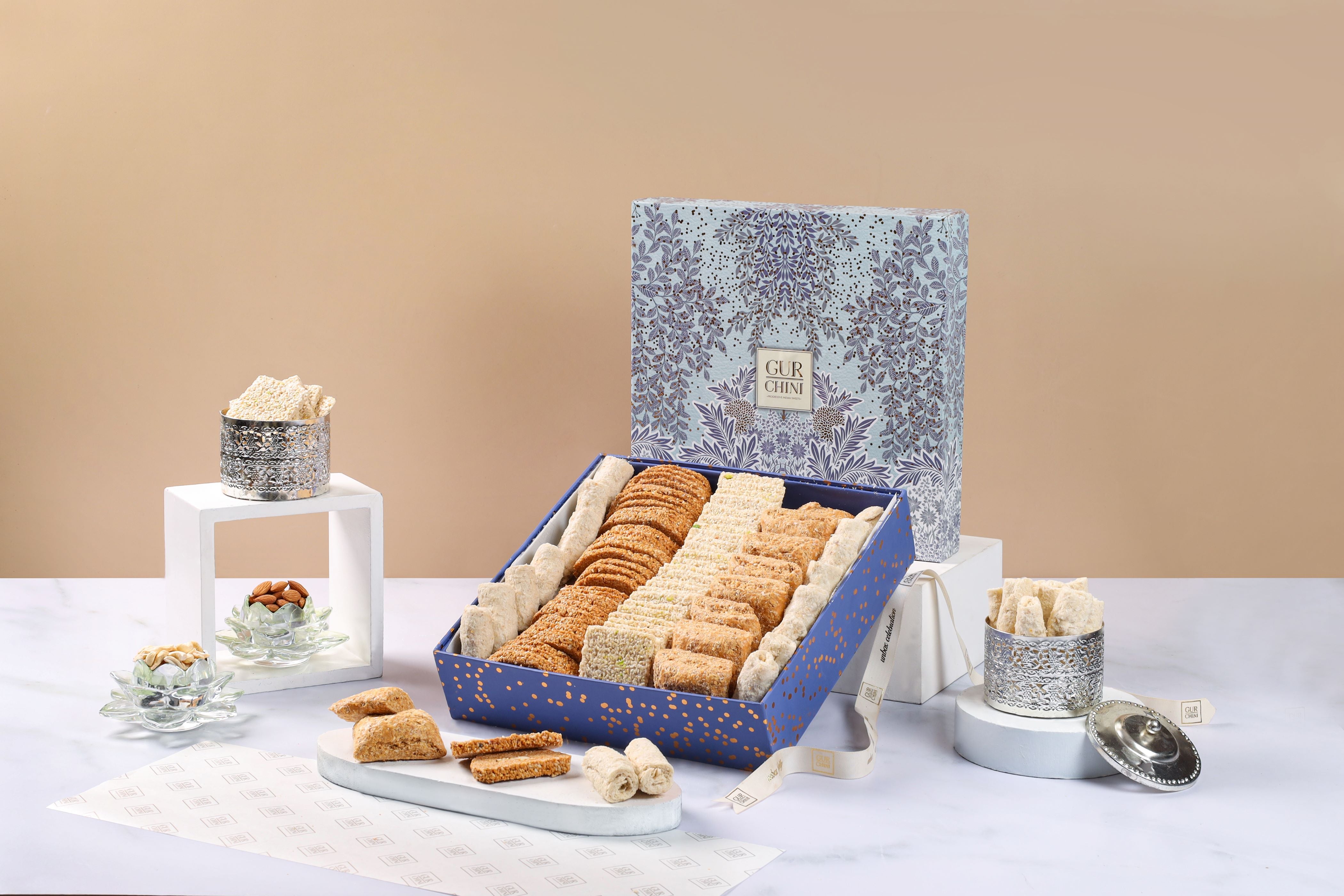 A Blue Rigid Box of Assorted Rewdi & Gajak