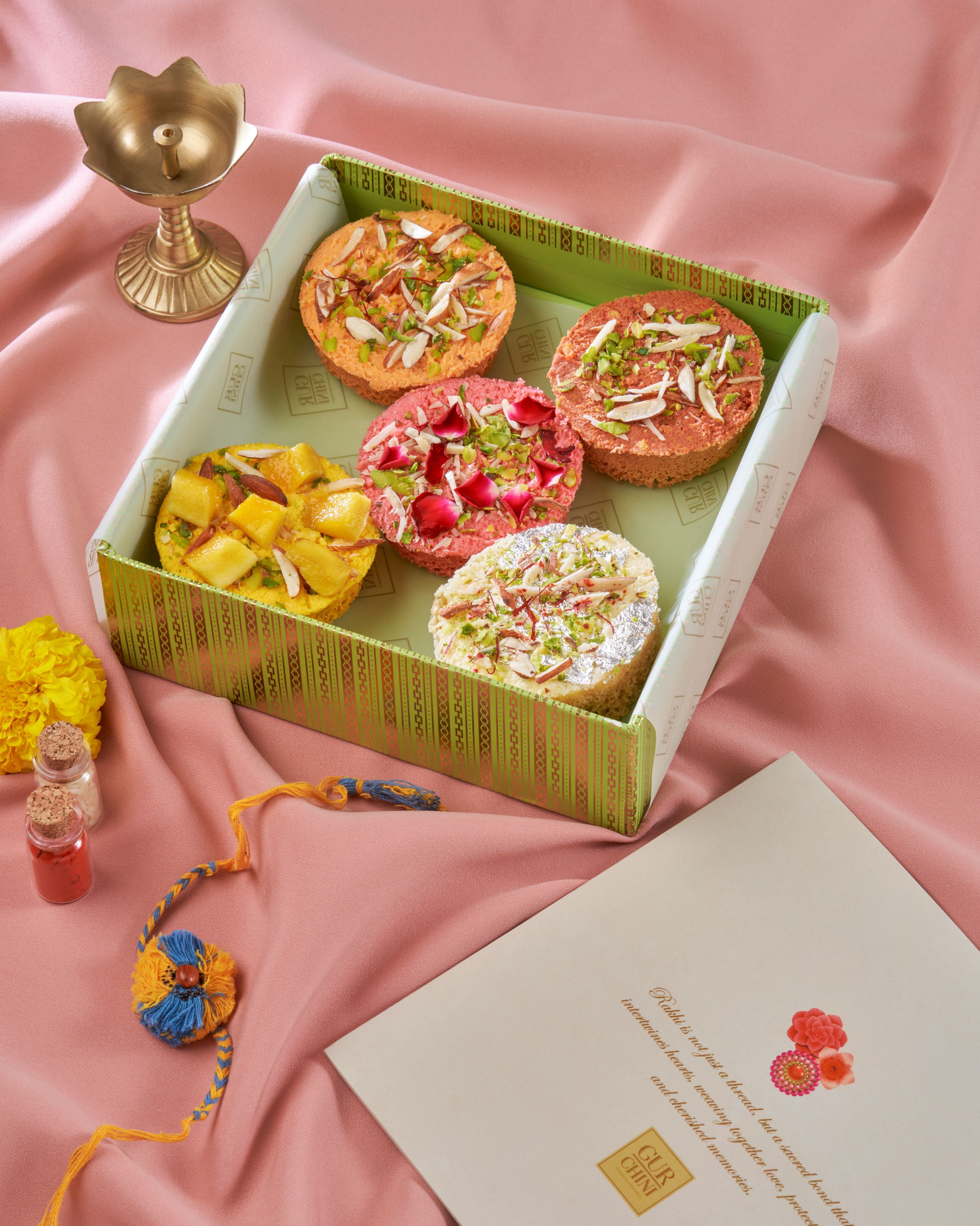 Rakhi Celebration Luxury Green Box With 5 Pcs Assorted Mini Ghewar of 16 Pcs