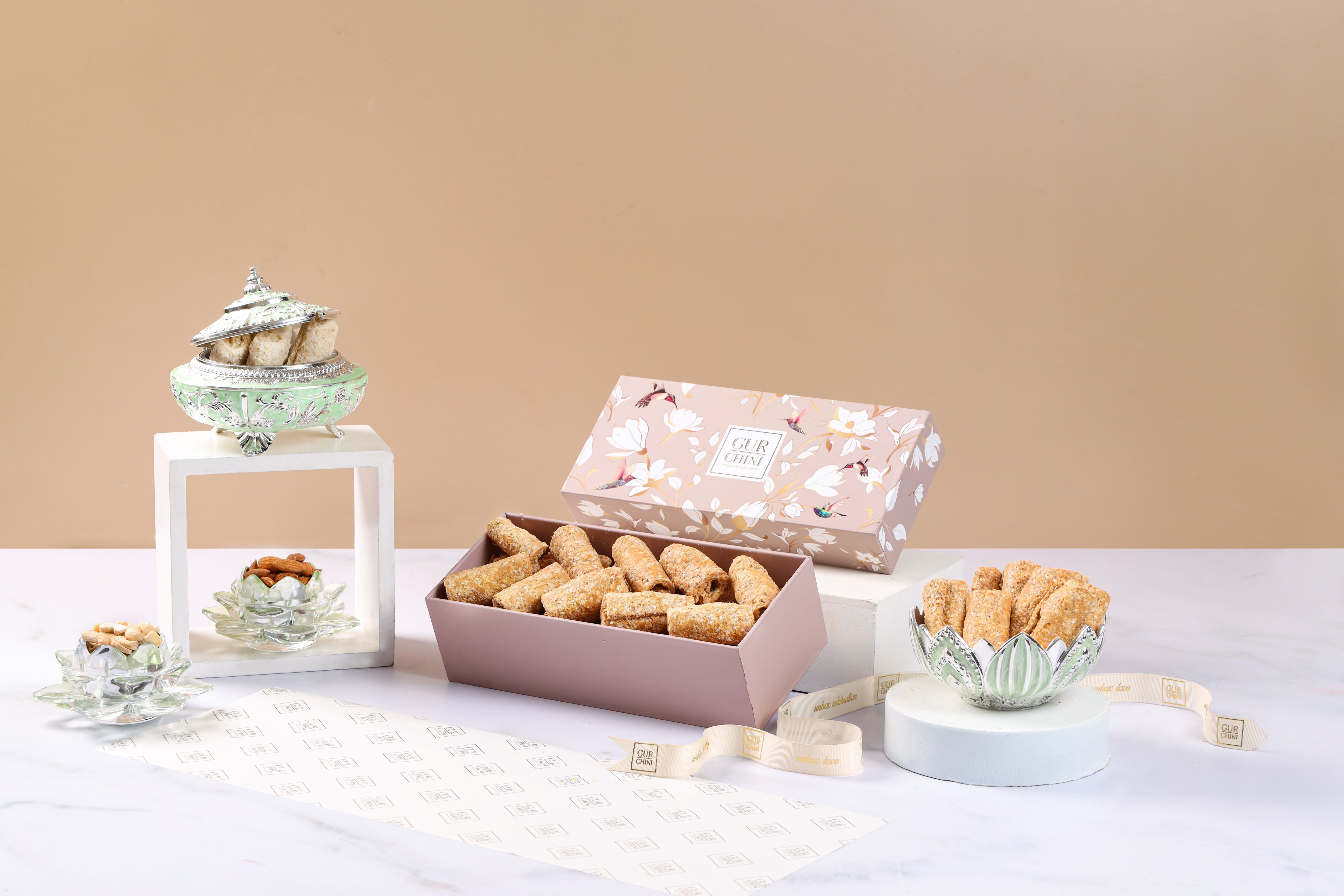 A Brown Flower Box of Til Gur Rolls