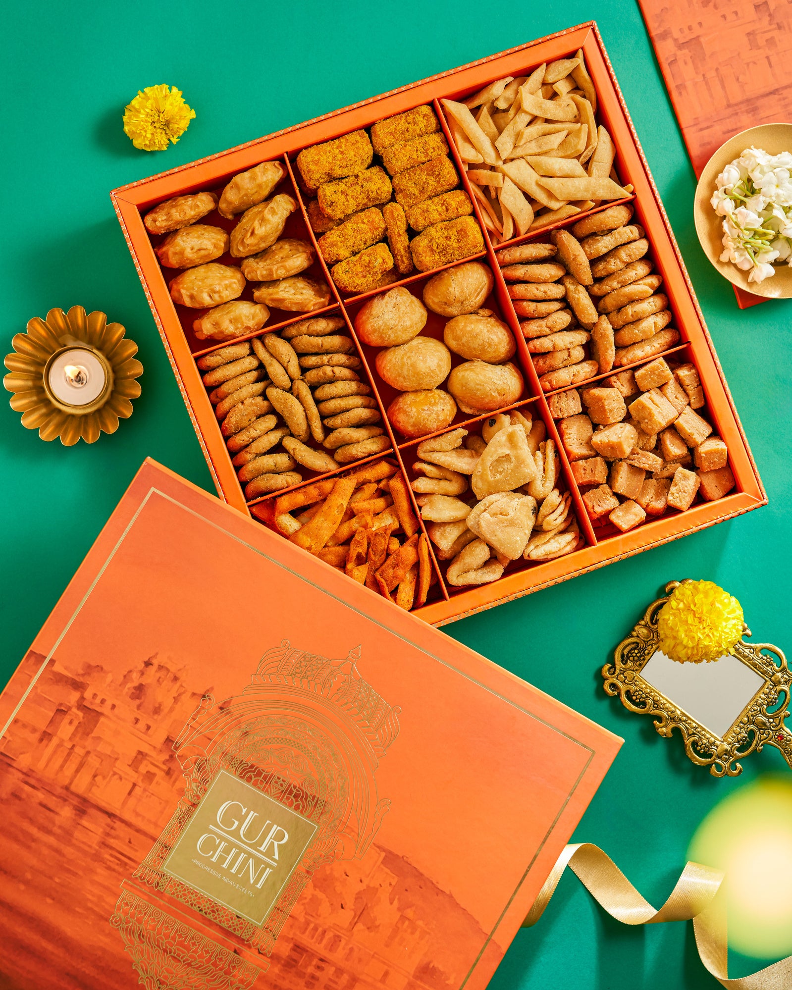 Diwali Special Luxury Orange Jharokha Assorted 9 Column Bhaji Box.