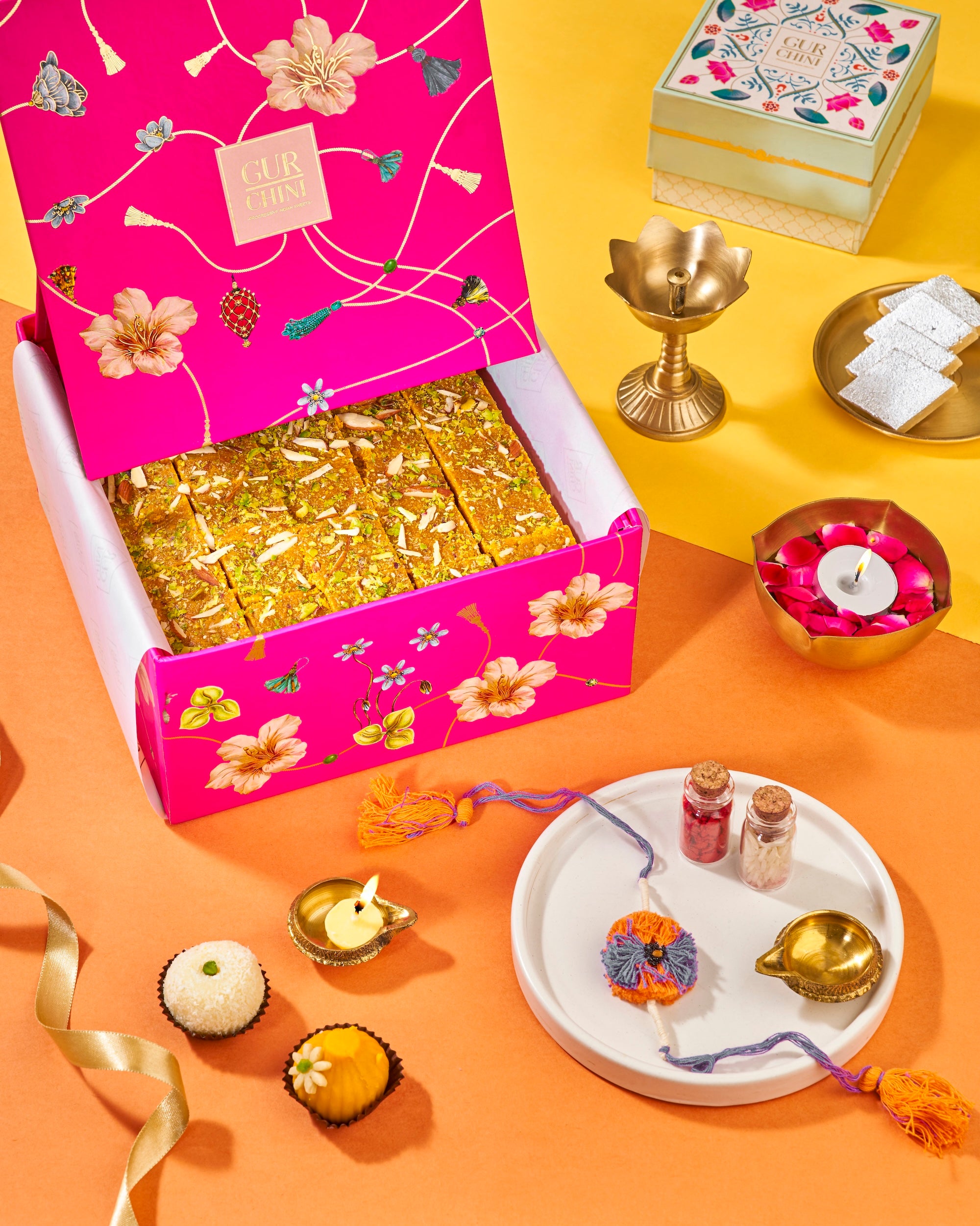 Rakhi Celebration With Luxury Pink Box of Besan Dry Fruit Burfi- 1KG