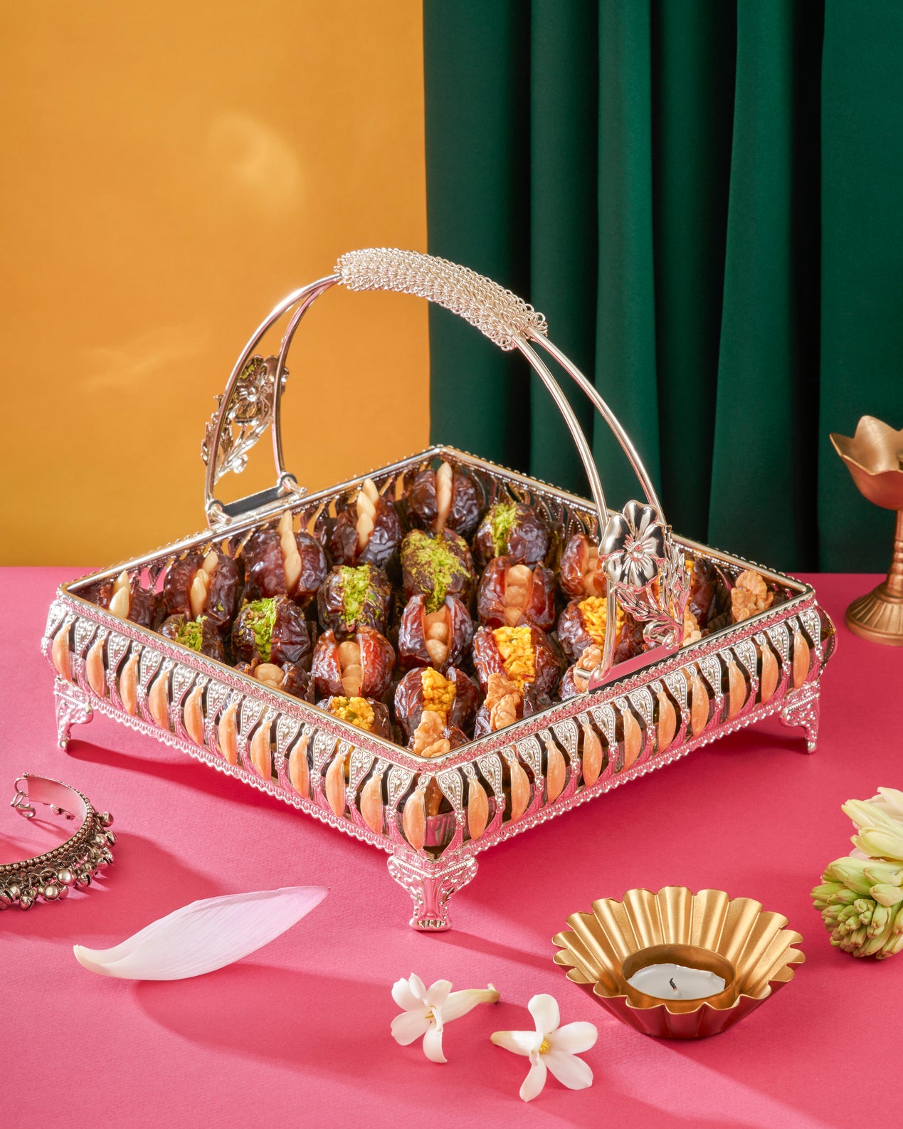 LUXUARY SILVER BASKET FILLED WITH VARIETY OF MEDJOUL DATES SWEETS